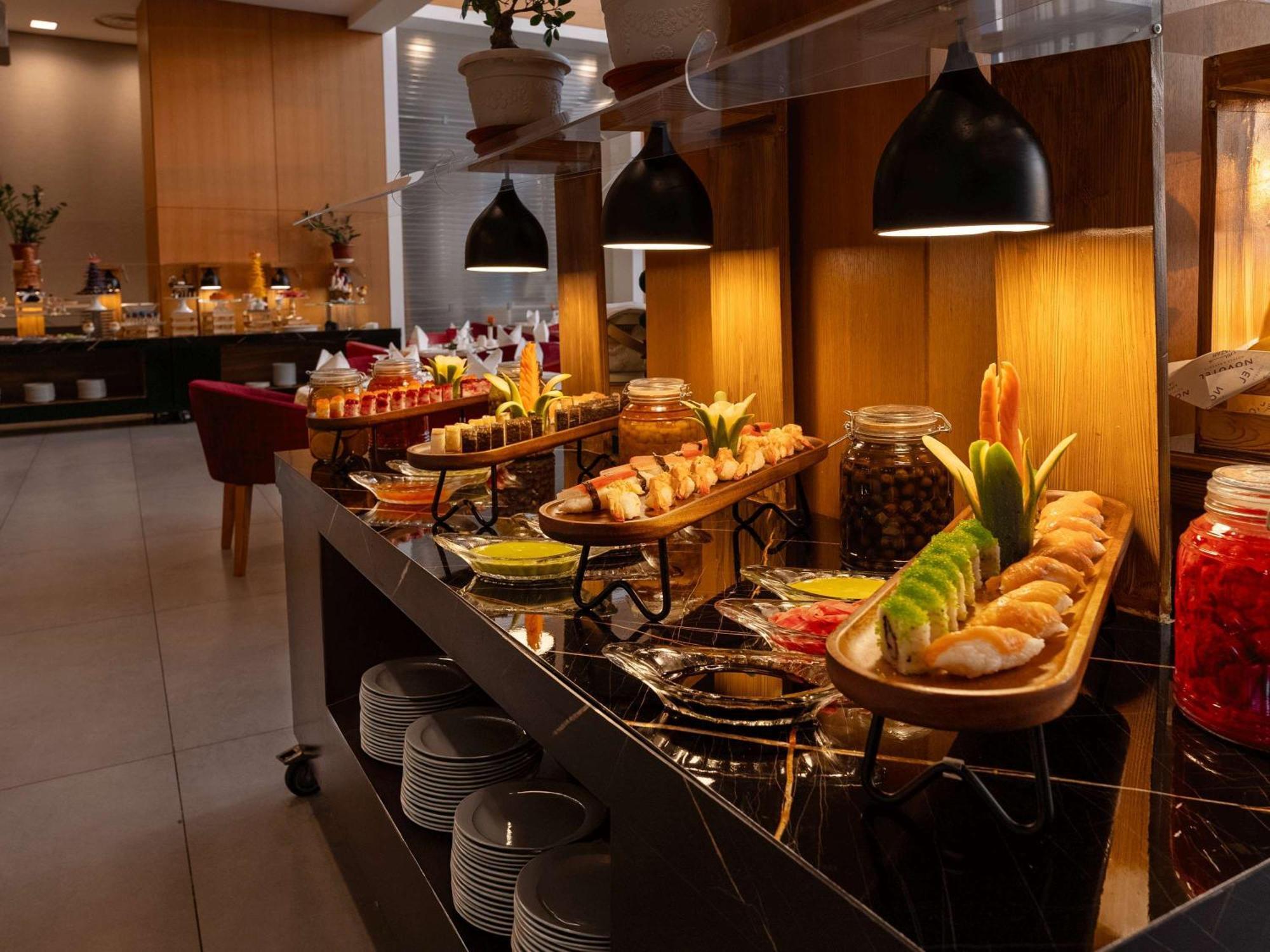 Novotel Jazan Exterior photo A buffet at a hotel