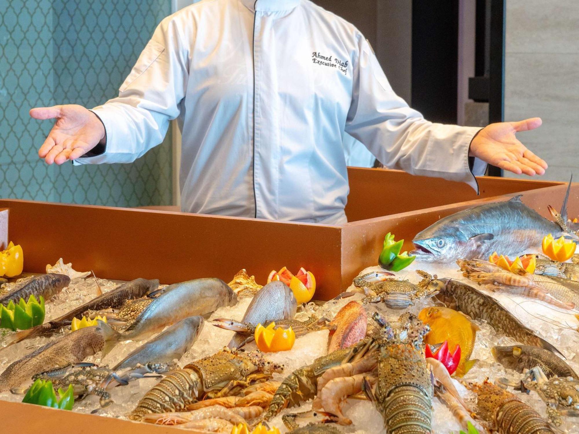 Novotel Jazan Exterior photo A seafood display at a restaurant