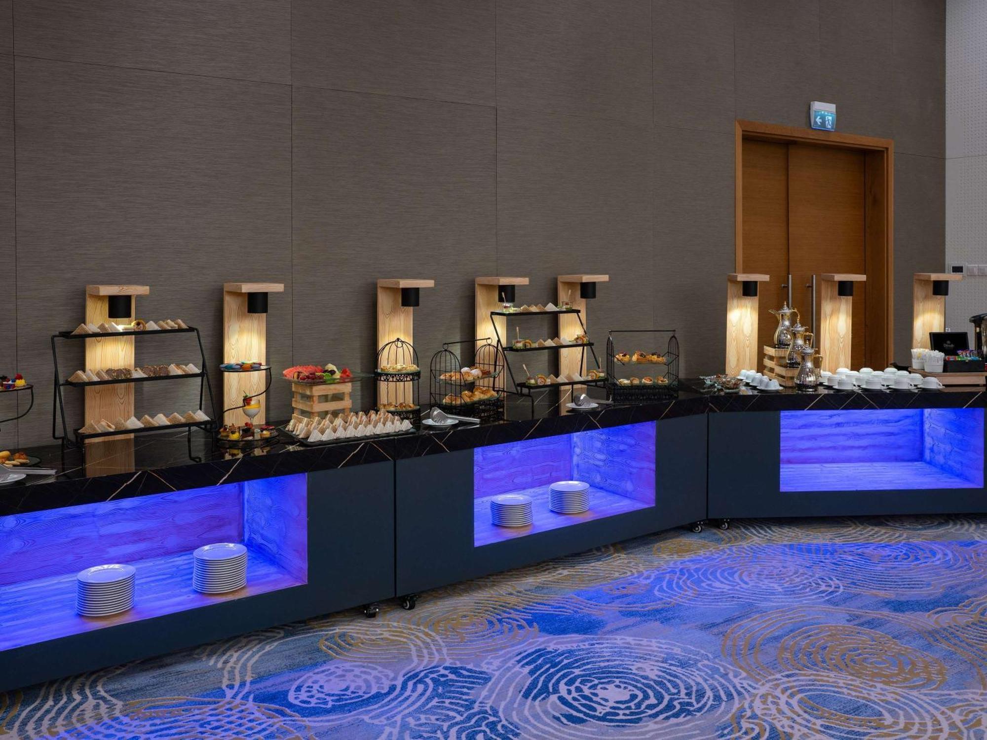 Novotel Jazan Exterior photo A buffet at a hotel