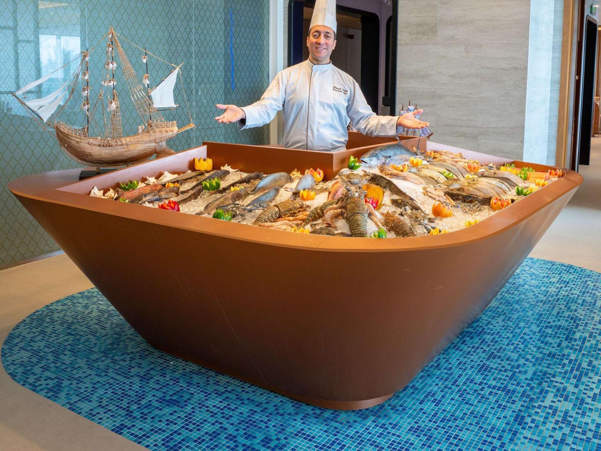 Novotel Jazan Exterior photo A seafood display at a hotel